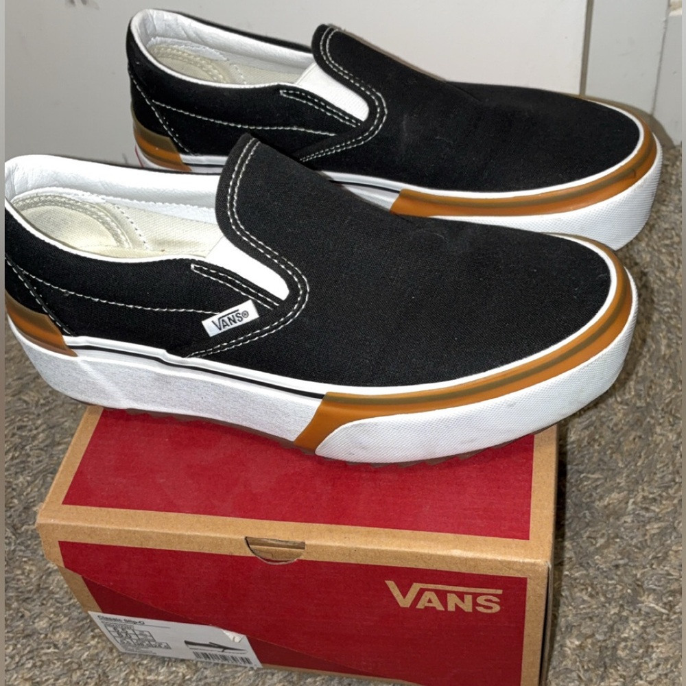 Vans Black and White Slip-On Sneakers